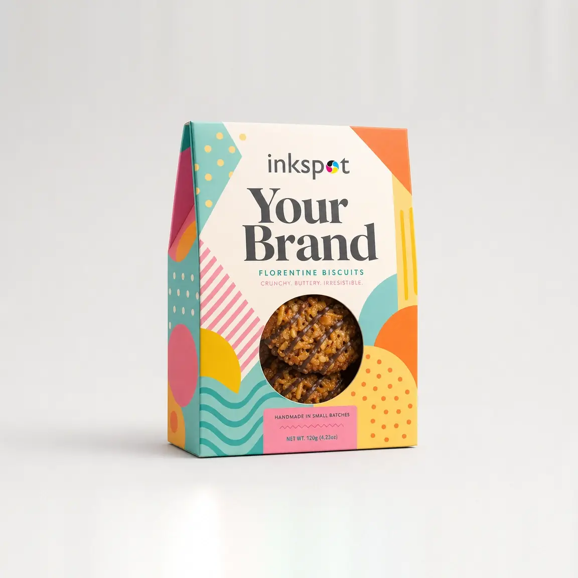 A colourful biscuit carton with a round patched window showing the florentines inside.